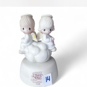 Precious Moments ‘…But Love Gies on Forever’ figurine